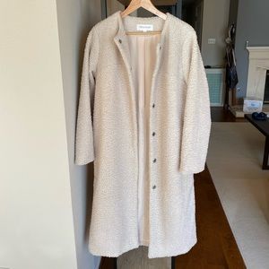Fleece-like floor length ivory jacket
